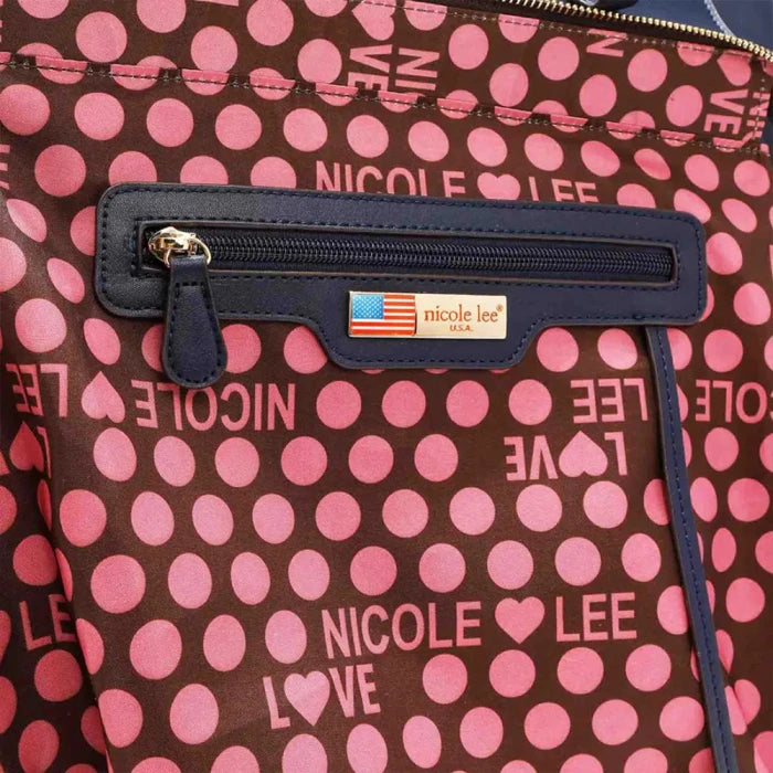 Nicole Lee Brown and pink polka dot handbag lining with zipper detail and American flag logo patch