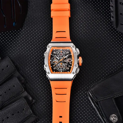 Orange strap Pagani Design watch on a leather backdrop with a visible mechanical core.