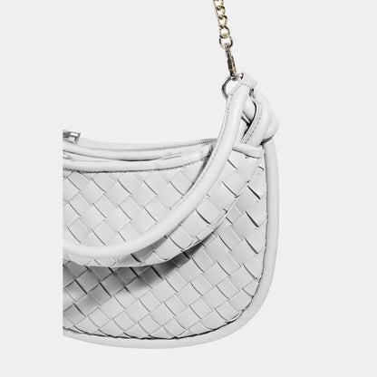 Silver white woven leather handbag with gold chain strap and knotted handle detail