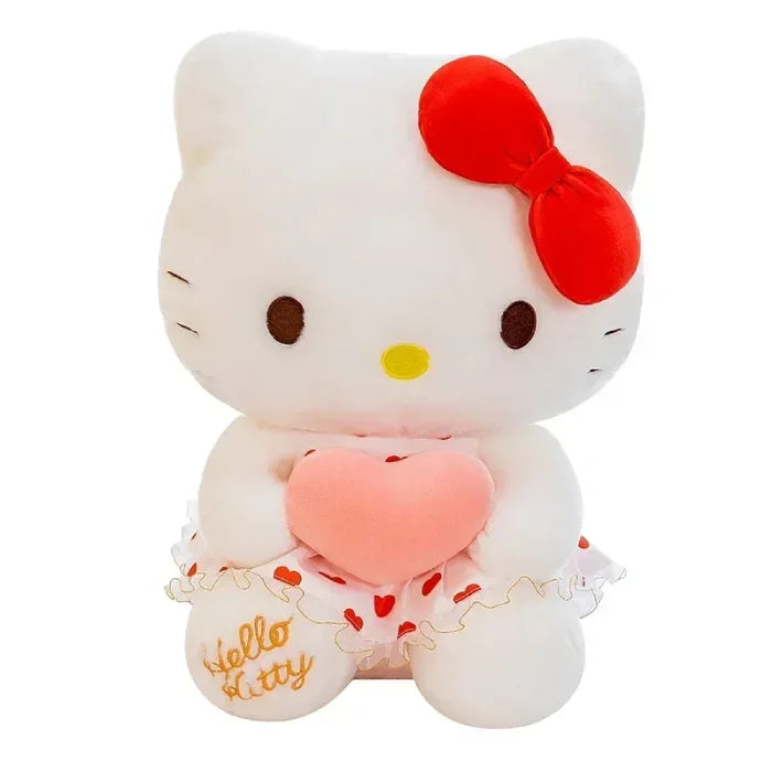 Single Hello Kitty plush sitting against white background with heart.