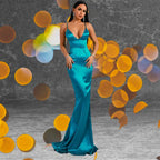 Model wearing a stunning teal satin formal dress with a deep V-neck and daring backless design, perfect to buy online for prom or evening events.
