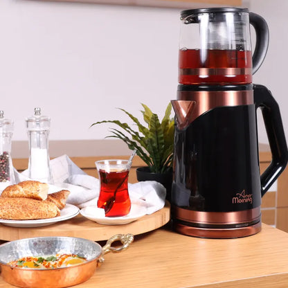 Electric tea maker serving traditional Turkish breakfast with red tea, eggs, and bread on wooden table.