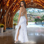  Stunning white sequin prom dress with crisscross open back, form-fitting silhouette and dramatic side slit, perfect for formal events