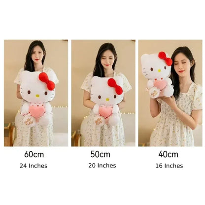 Woman with red lipstick holds large Hello Kitty plush, showing size comparison.