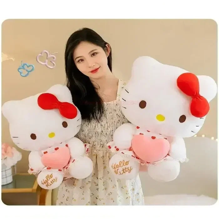 Happy woman holding two large Hello Kitty plush toys, close-up shot.