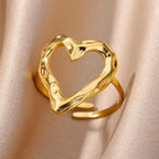 adjustable open heart ring in polished gold with textured design displayed on satin, creating an elegant premium minimalist jewelry look