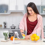 Adjustable phone stand used in kitchen for hands-free viewing while preparing food, offering stable device support and convenience.