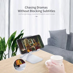 Adjustable phone stand supporting horizontal viewing for movies with clear subtitles, offering stable device placement and comfort.
