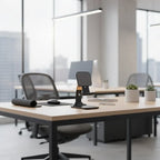 Adjustable phone stand in black placed on modern workstation desk, offering stable ergonomic device support for office productivity.