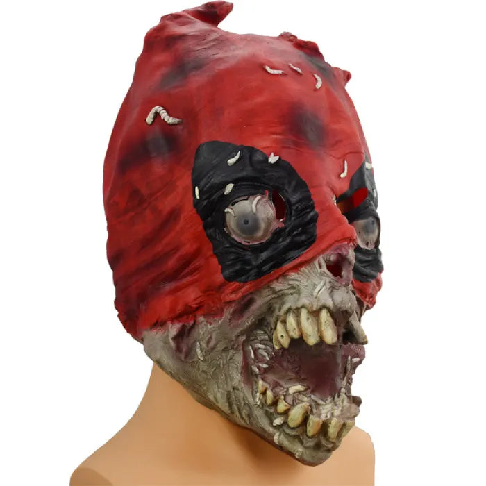 Adult full head scary Halloween mask with red hood and decayed zombie face.