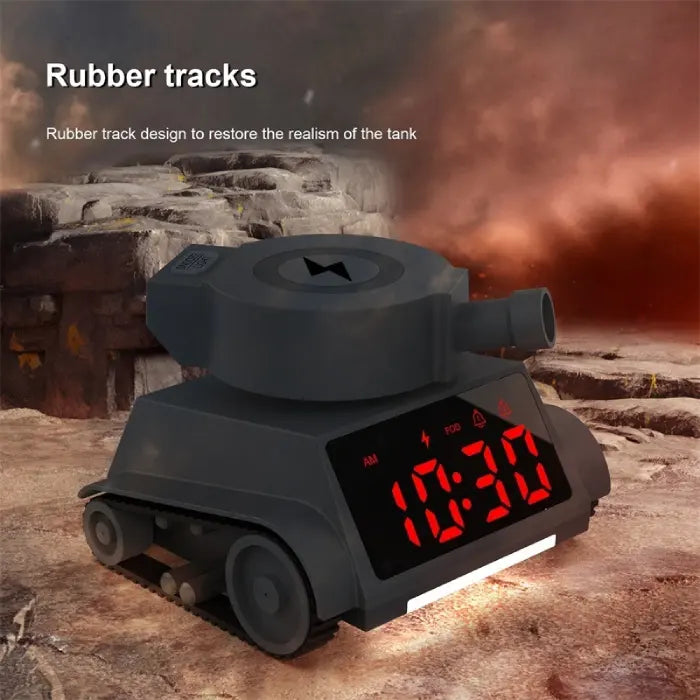 Alarm clock with realistic rubber tank tracks placed on rugged terrain background.