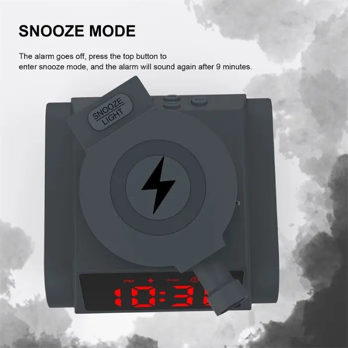 Alarm clock featuring top snooze button and power icon on tank turret design.