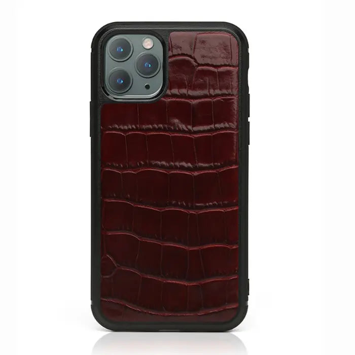 Alligator Skin Phone Case in burgundy leather with crocodile texture on a protective phone cover.