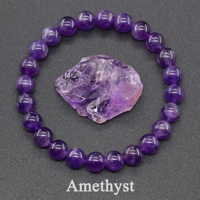 Amethyst jewelry bracelet with raw crystal stone centerpiece and round beads, natural gemstone design for healing and stylish wear