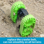 amphibious rc car kicking gravel on rocky ground, crawler belts gripping tightly while rolling fast across rough terrain outdoors today