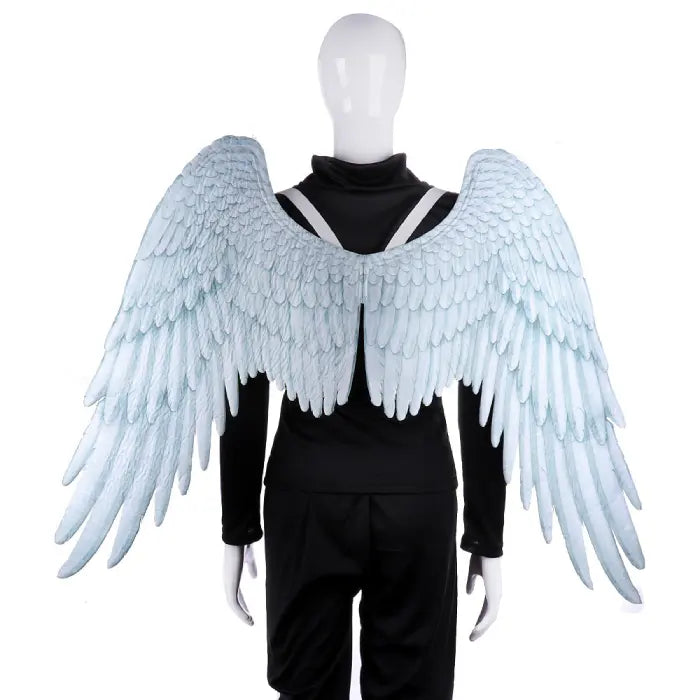 Angel wings gray-blue tone feather design on black costume with mannequin display.