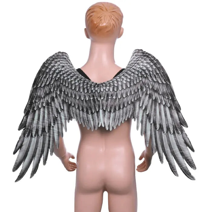 Angel wings on mannequin costume with gray feathers and shoulder straps shown from the back.