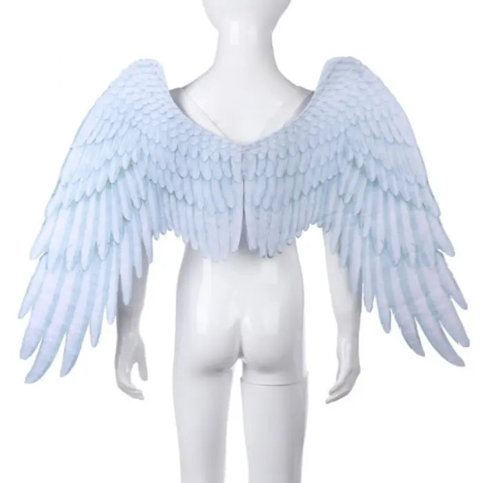 Angel wings white plush feather design on mannequin back with wide span and soft texture.
