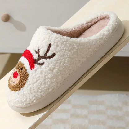 anti slip Plush holiday slippers with a reindeer design featuring a red nose and festive details.