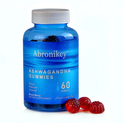 Close-up of Abronikey ashwagandha mixed berry gummies bottle with red gummy supplements