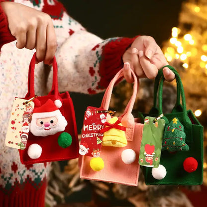 Set of Christmas gift bags in red, pink, and green with festive ornaments, pom-poms, and holiday tags.