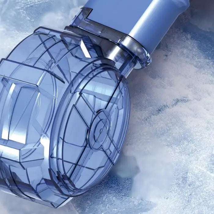 Automatic water gun close-up of blue transparent drum magazine with icy background and detailed texture
