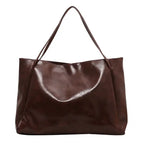 Autumn Shoulder bag in dark brown faux leather with soft slouchy design and dual handles
