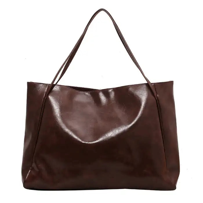 Autumn Shoulder bag in dark brown faux leather with soft slouchy design and dual handles