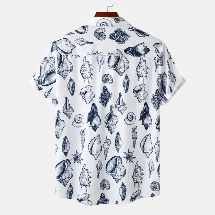  Back view of men's plus size printed button up short sleeve shirt with navy seashell print on white background