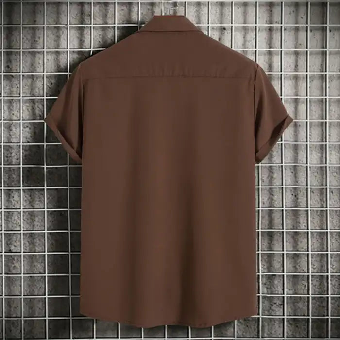 Back view of men's plus size casual short sleeve button-up shirt in brown hanging on grid wall.