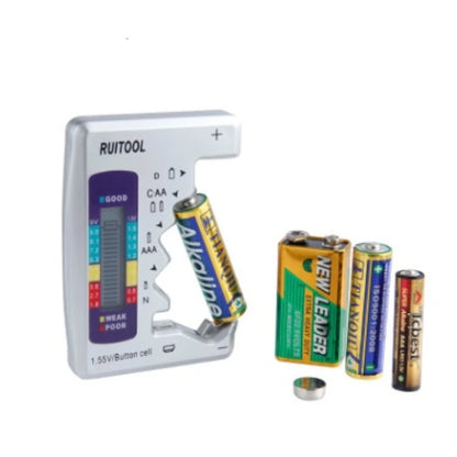 Battery tester checking an AAA battery, with multiple battery types like AA, 9V, and lithium displayed beside it.