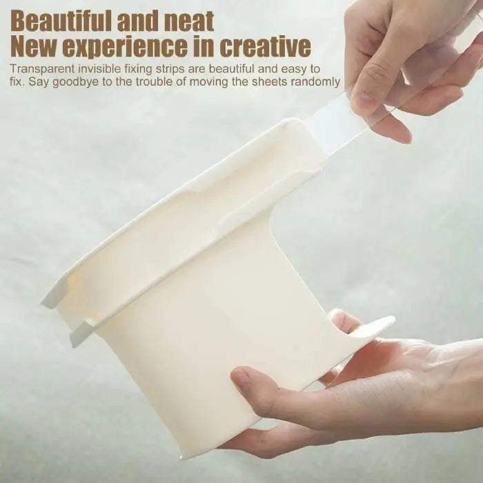 Close-up of bed sheet secure clips being held, showing strong grip and easy-to-use design.