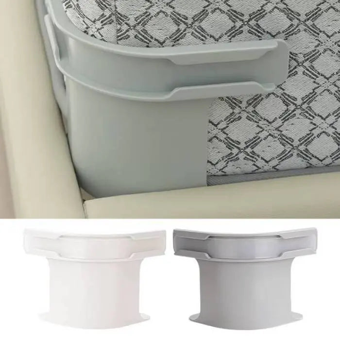 Bed sheet secure clips attached to the corner of a mattress, ensuring a snug fit.