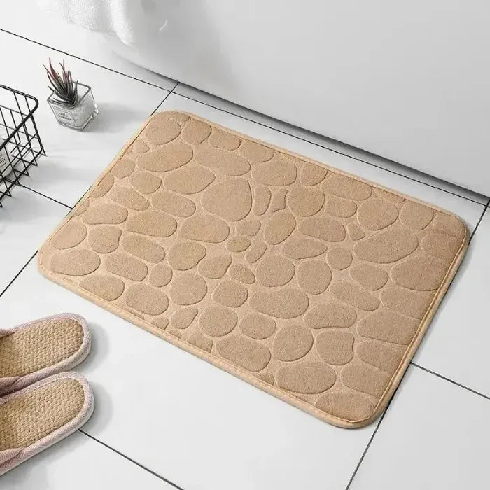 Simple and elegant beige bathroom mat, suits any decor style.