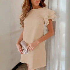 Beige ruffle sleeve shift dress front view with layered sleeves and clean structured shape.