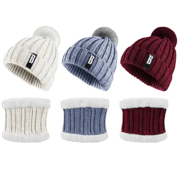 Bennie Hat Scarf Set displayed in red, cream, and blue with soft fleece interior and knit texture.