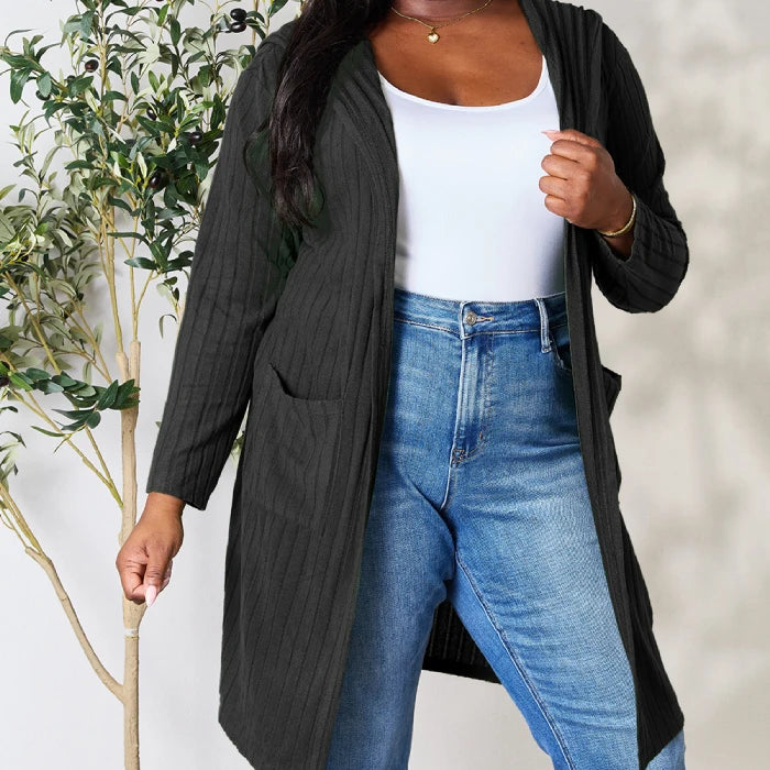 Trendy plus size black ribbed cardigan paired with classic blue jeans and white tank top for versatile everyday style