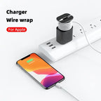 Black charger with cord wrap designed for Apple devices, ensuring organized and efficient charging.