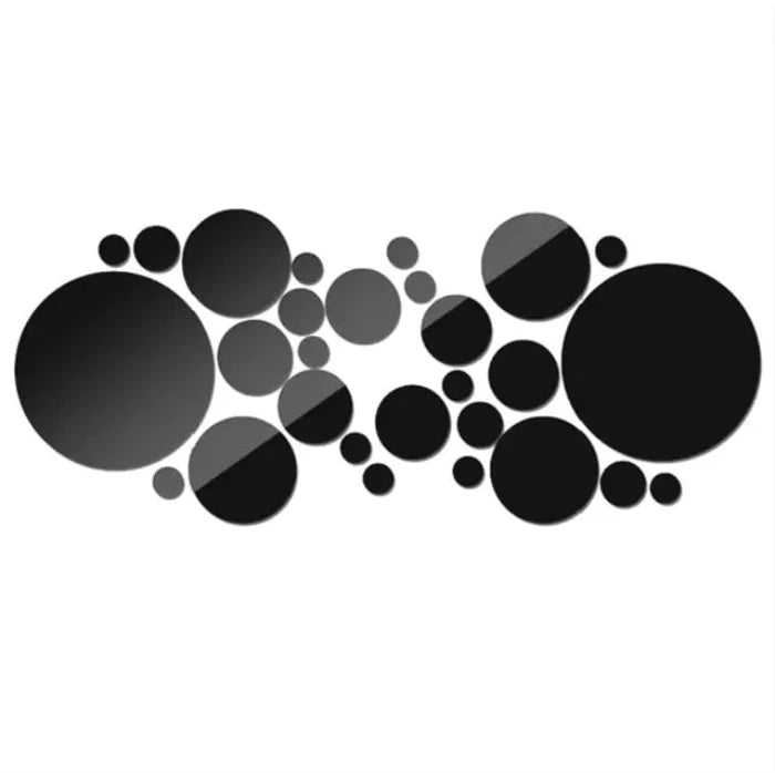 Set of round black mirror in various sizes arranged in a scattered pattern on a white background 