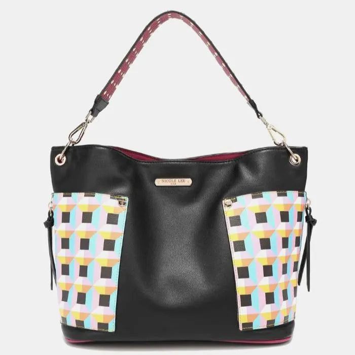 Stylish Nicole Lee handbag featuring black leather with pastel geometric print panels and burgundy accents, silver hardware details