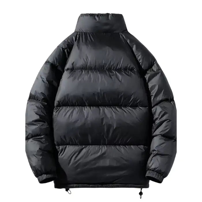  Black oversized puffer jacket horizontal quilted from back, showing stand-up collar and elastic hem with drawstrings.
