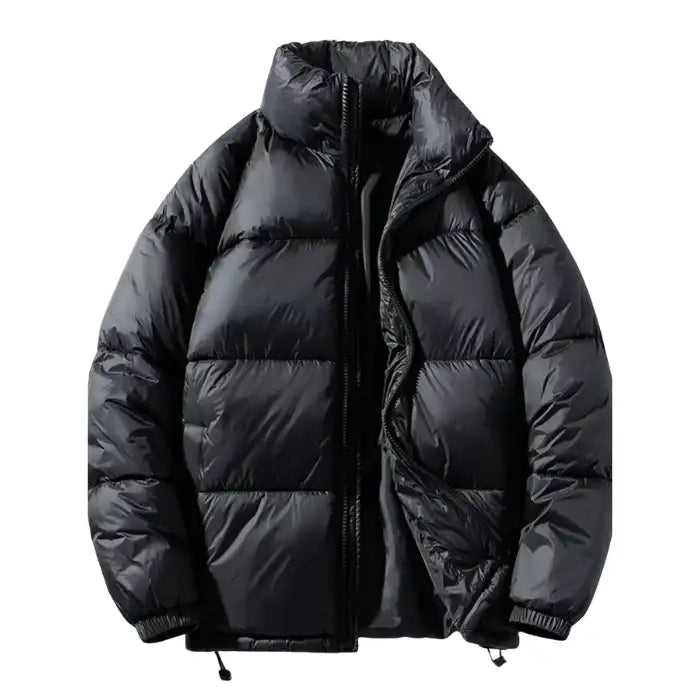  Black oversized puffer jacket horizontal quilted with high collar, zipper open showing interior, elastic cuffs.