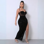 Black sequin spliced mesh dress with a thigh-high slit, sheer corset bodice, and spaghetti straps.