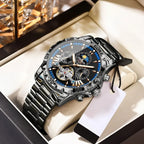All-black stainless steel automatic chronograph watch with blue accents and exposed mechanical movement display