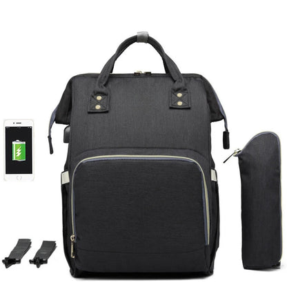 Modern black diaper backpack with USB charging port, bottle warmer case and stroller straps for smart parenting on the go