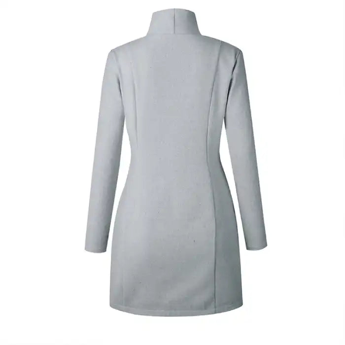 Blouse woolen coat shown from the back with clean tailoring and smooth wool finish, highlighting its fitted winter overcoat silhouette