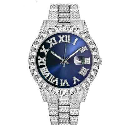 Silver watch featuring blue dial and Roman numerals, encrusted with diamonds.