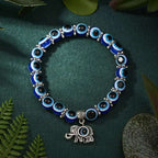 Blue evil eye bracelet with an elephant charm, symbolizing luck and Turkish protection.