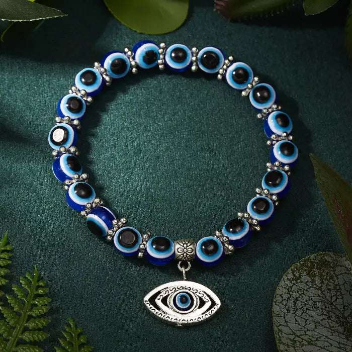 Blue evil eye bracelet with a silver eye charm for Turkish protection and warding off negativity.