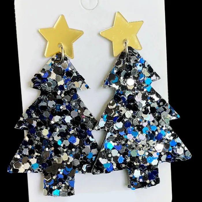 Handmade blue glitter Christmas tree earrings with gold star tops, ideal for holiday fashion statements.